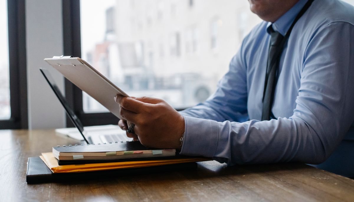 Professional reviewing financing documents
